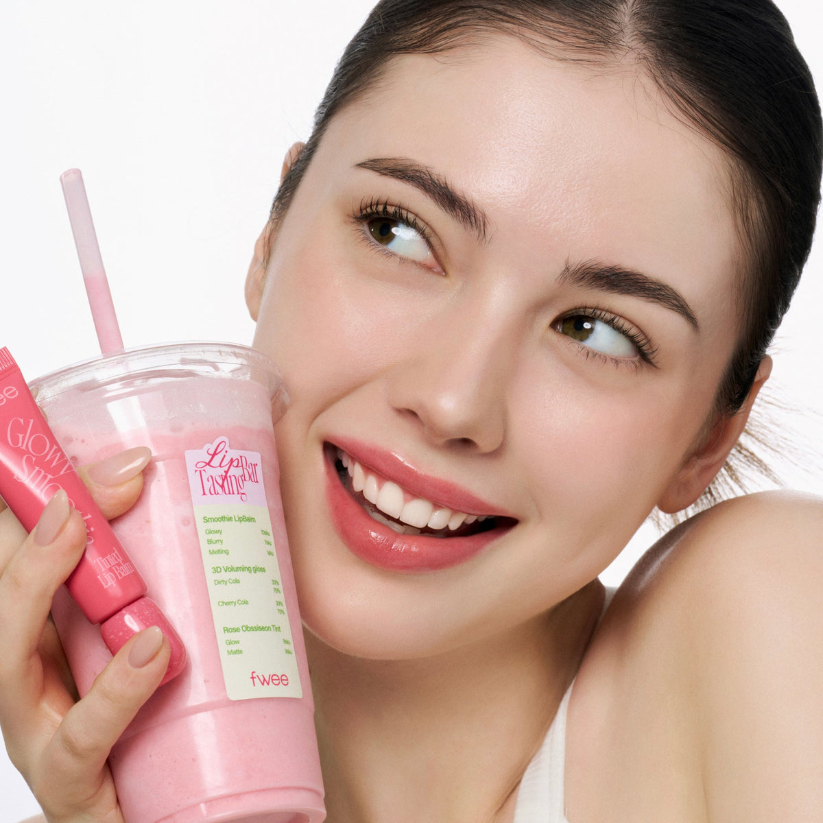 fwee Glowy Smoothie Tinted Lip Balm 9.5g applied for a glossy tinted finish